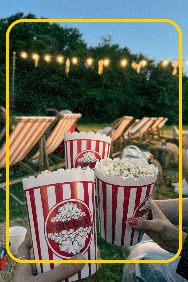 Friends Eating snacks at the movies during the summer time.